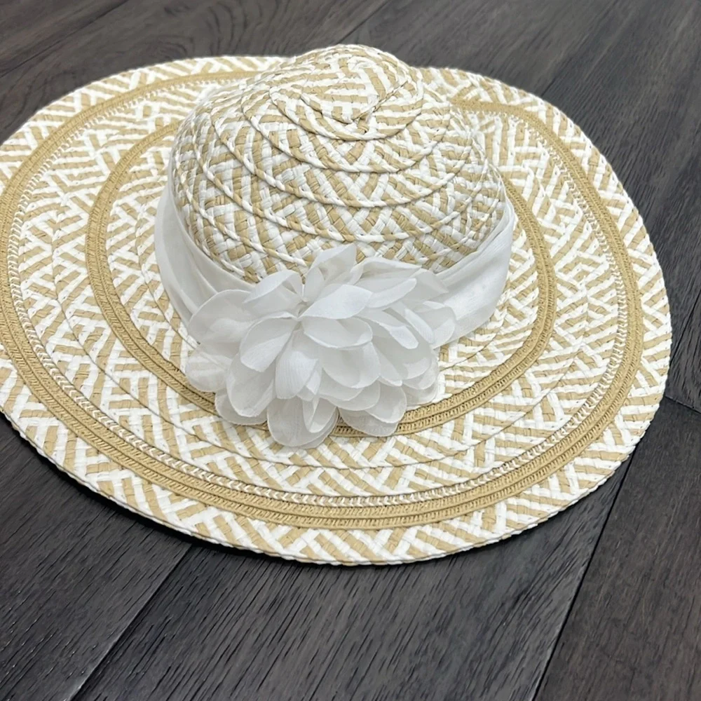 Infant stylish brim sun hat with sheer like floral sash.